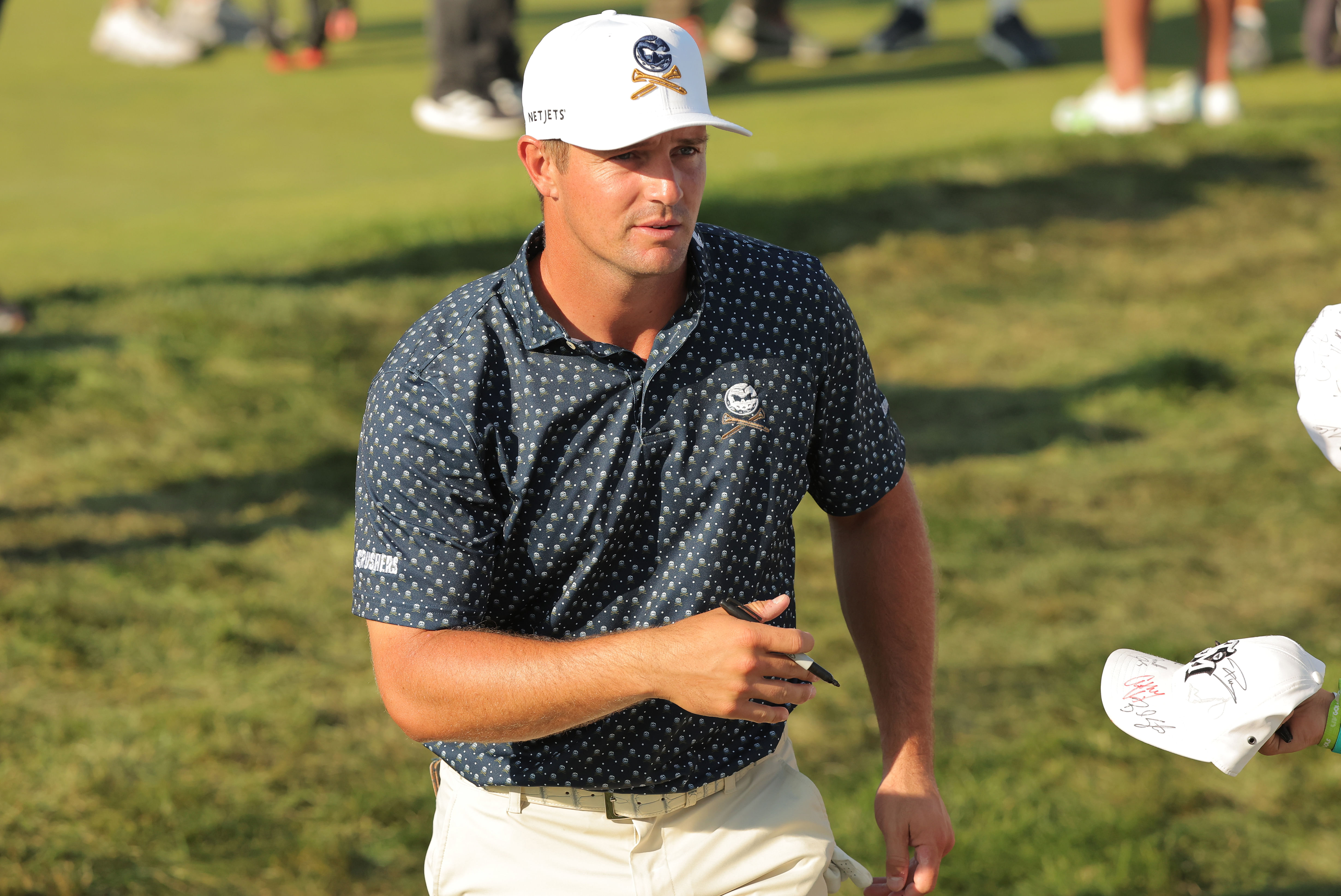 Bryson DeChambeau will play (Image via Imagn)